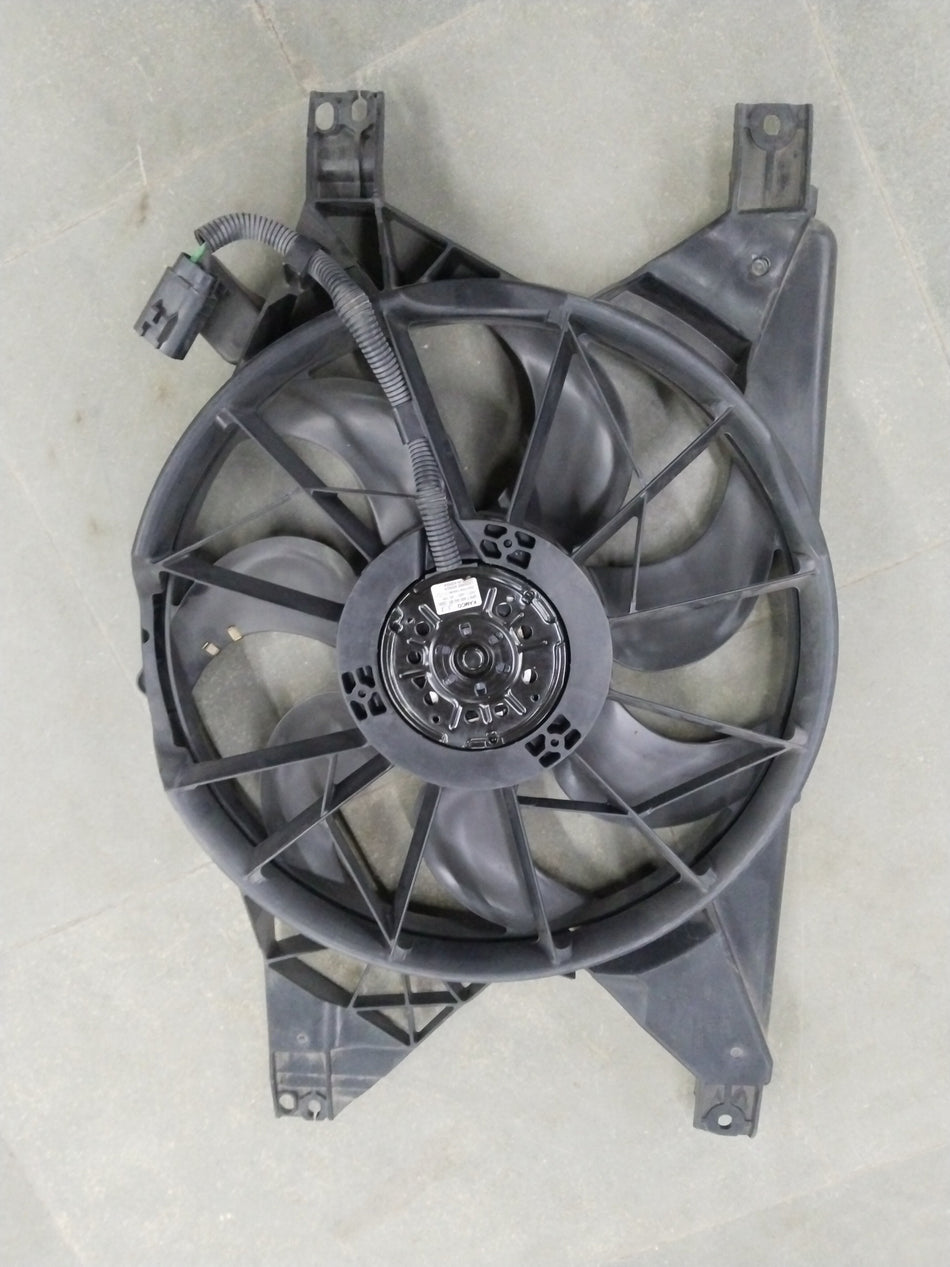 Chevrolet Optra fan main, General Motors original part, showing the black plastic fan assembly with mounting points.