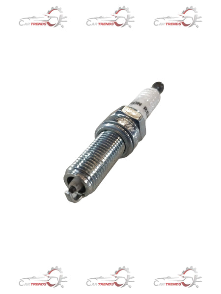 Hyundai Spark Plug Assembly Spare Part by CarTrends, close-up view showing metal connector and ceramic insulator.