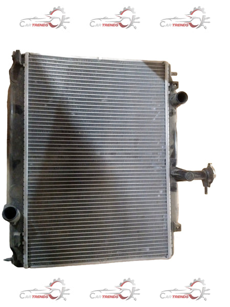 CarTrends Verna old model radiator assembly for petrol engines, spare parts image showing the radiator with mounting brackets.