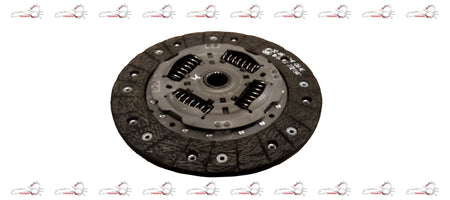 Maruti Suzuki clutch plate for Swift diesel engine, showing the metal friction surface and clutch disc assembly.