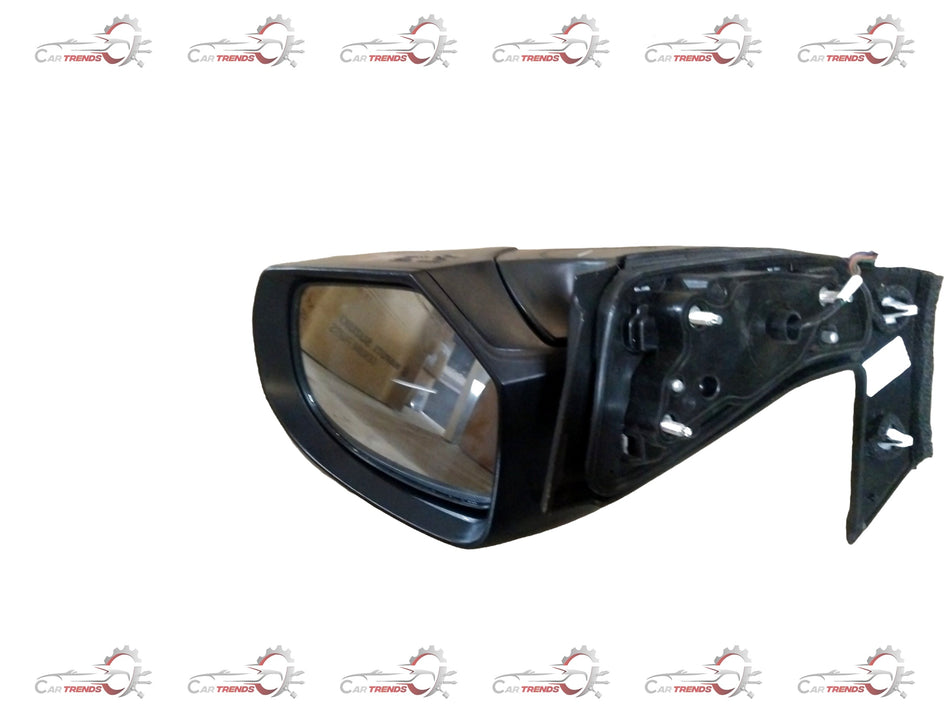 Maruti Suzuki rearview mirror assembly with reflective glass and mounting bracket for vehicle side or interior use.