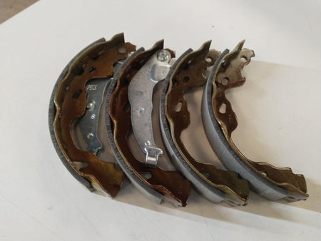 Rear brake shoe for Maruti Swift 1st Gen, Swift Dzire, and Esteem by CarTrends, showing the brake shoe component.