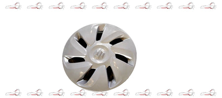 Maruti Suzuki Celerio silver wheel cap showing the clean, round design with the Maruti Suzuki logo in the center.