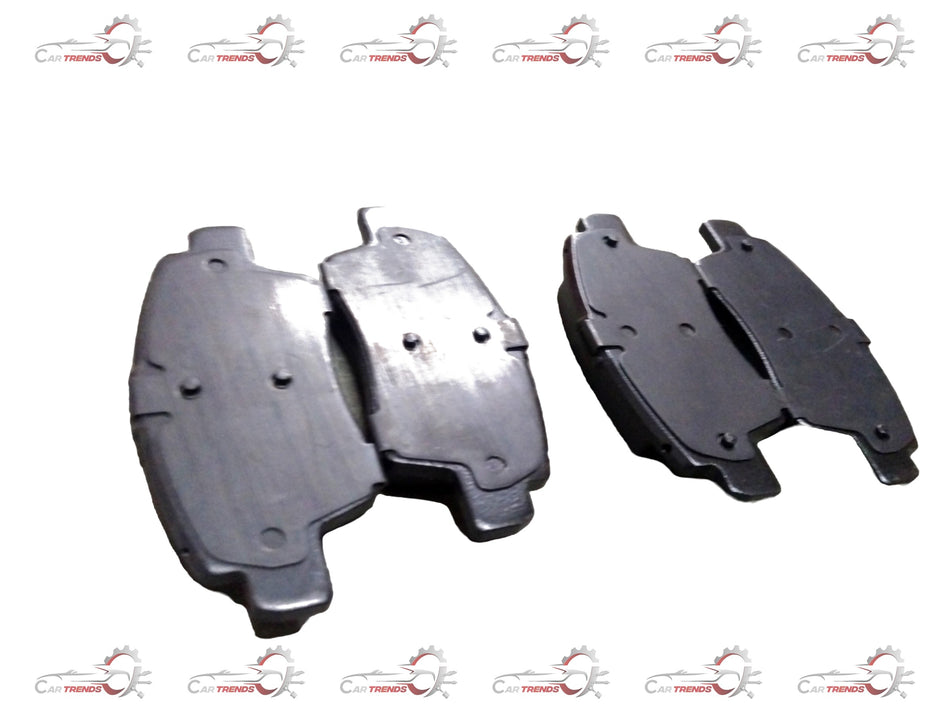 Front brake pad for Triber, Magnite, Kwid 2020 by CarTrends, showing the new brake pad component with detailed surface texture.
