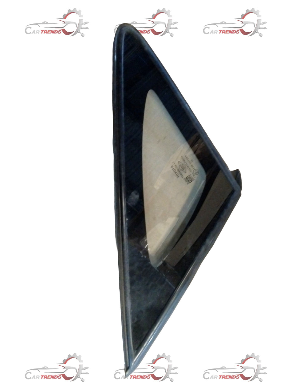 Toyota front right window assembly spare part by CarTrends, showing the glass and frame of the window in the image.