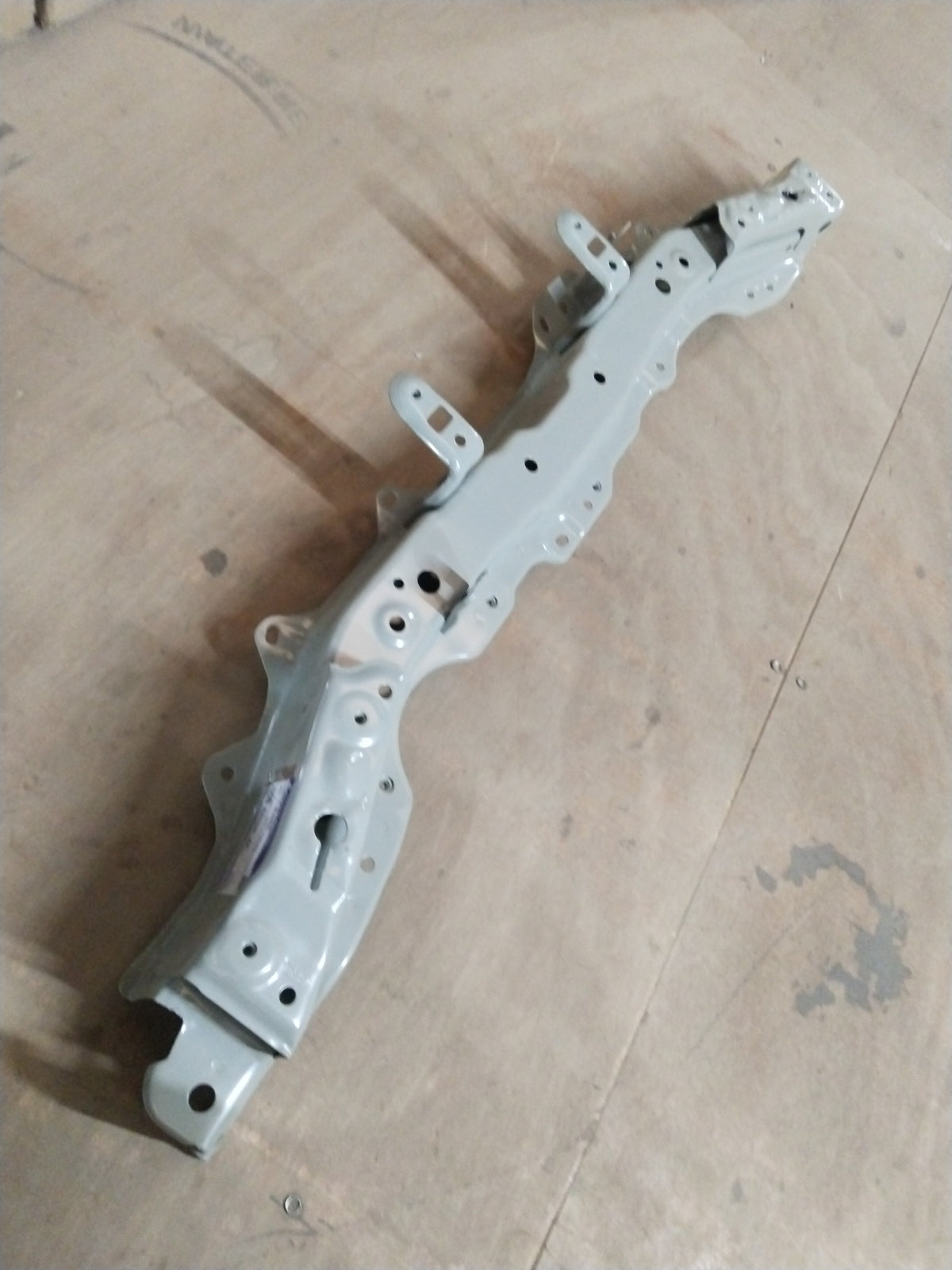 Maruti Suzuki S-Presso hood lock member, durable auto part designed for secure hood closure on the compact hatchback.