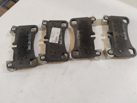 Aftermarket front brake pad for Audi Q7, shown in black with metal backing, designed for reliable vehicle braking performance.