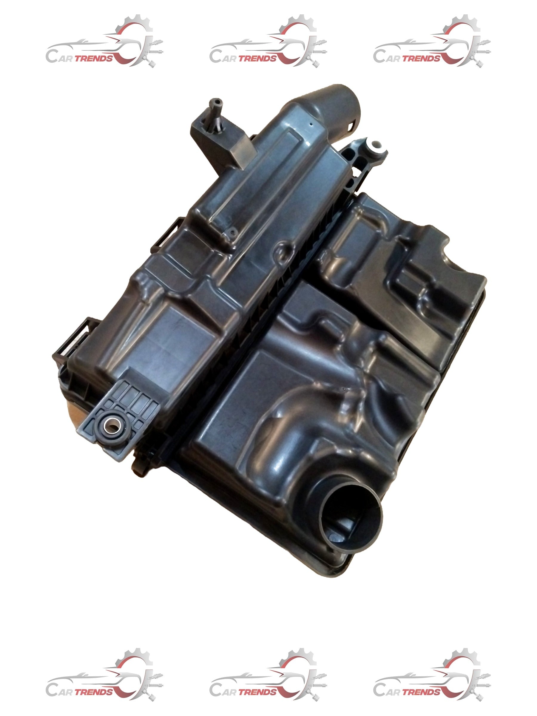 Hyundai Grand i10 petrol air cleaner assembly showing the black plastic filter housing and intake components.
