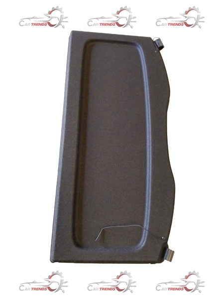 Maruti Suzuki Fronx grey rear parcel tray showing the black plastic surface and attachment points for cargo storage.
