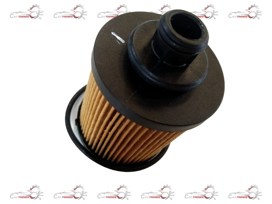 Maruti CarTrends oil filter for Swift and Baleno, showing the cylindrical filter with metal components and rubber seals.
