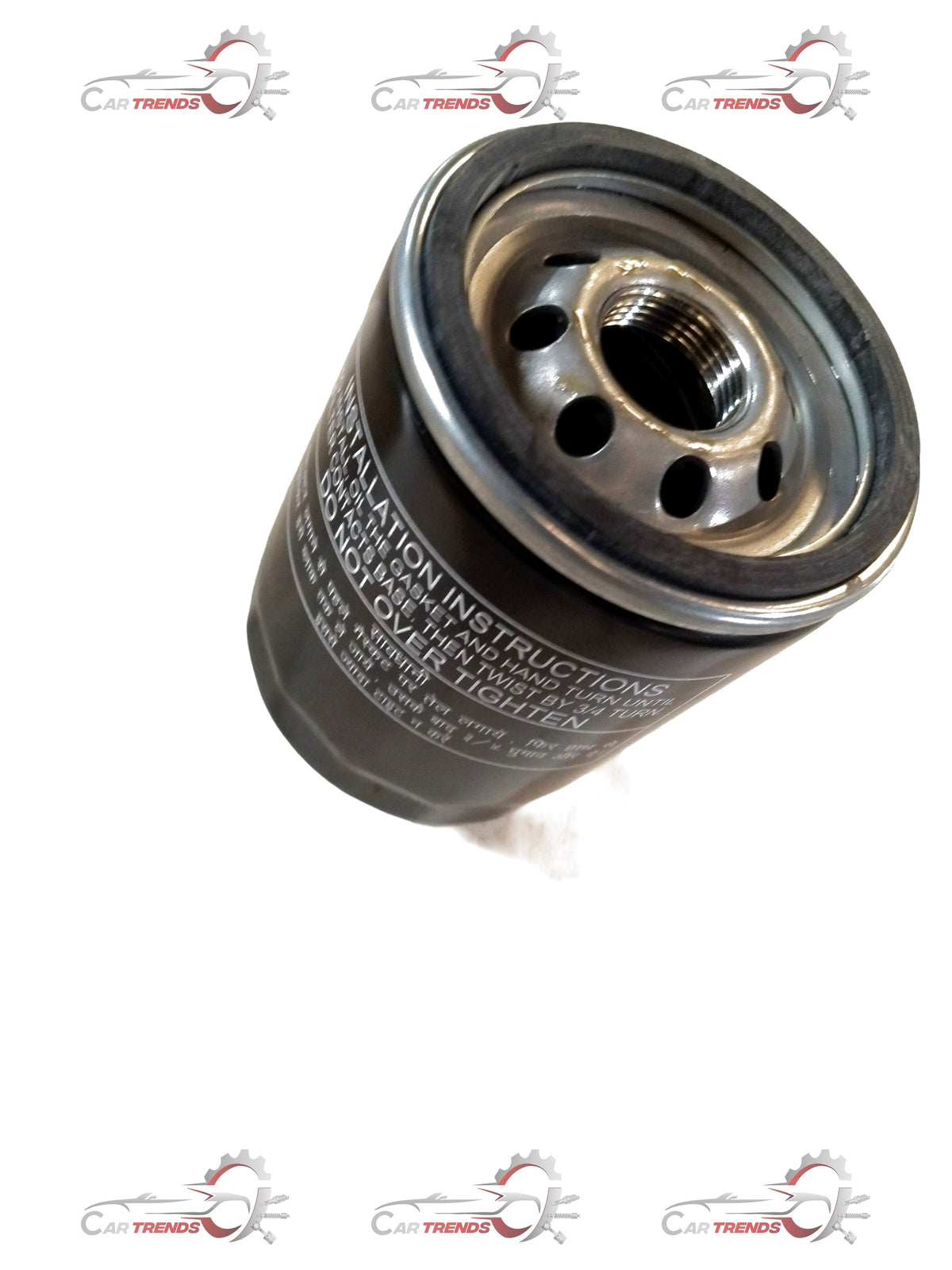 TATA oil filter assembly for Tata Nexon, Tiago, Altroz, showing the cylindrical metal filter with rubber seals and metal mounting parts.
