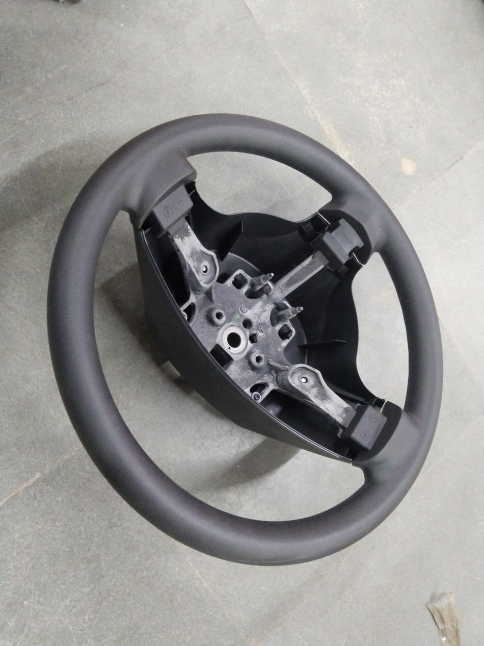 General Motors Chevrolet Enjoy steering wheel assembly with visible spokes and central hub, designed for vehicle steering system.