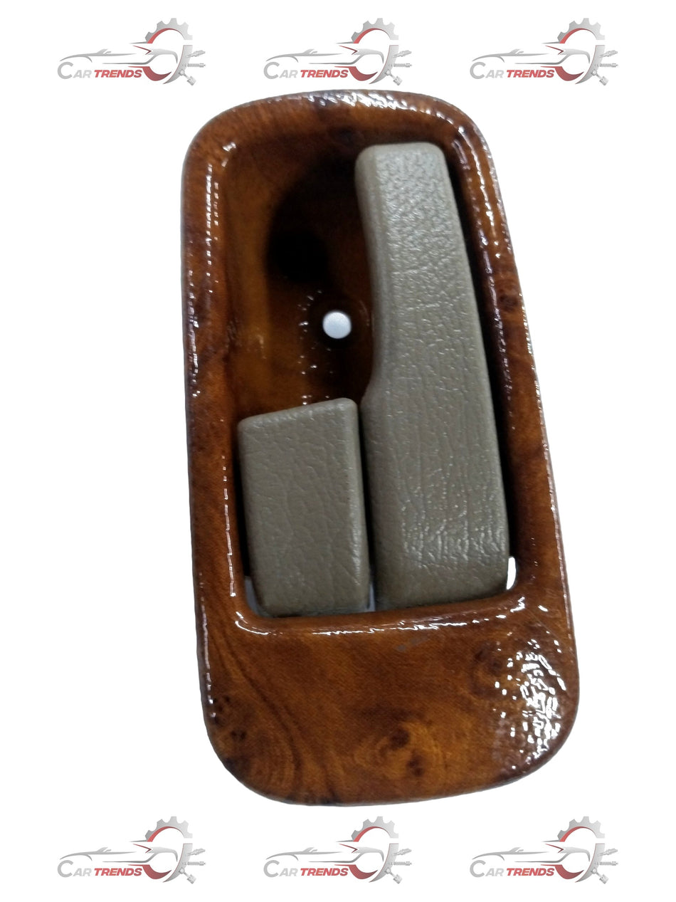 Chevrolet Tavera inside door handle spare part by CarTrends, left-hand side, close-up view of the handle mechanism.