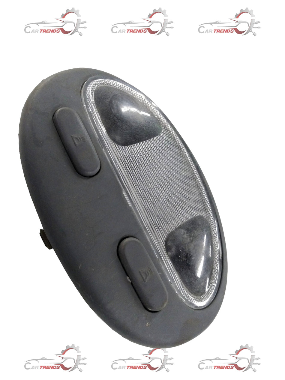 Chevrolet Optra front lamp from CarTrends, clear view of the petrol headlight assembly with reflective components.