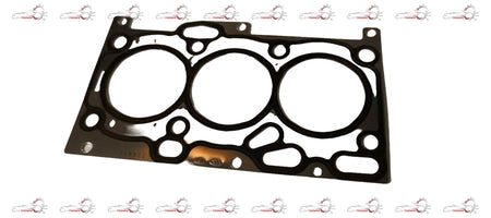 Hyundai cylinder head gasket showing a metal seal with bolt holes, designed for engine sealing and repair.