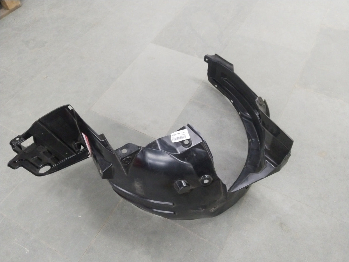 Honda Brio LH front inner fender assembly, OEM part with metal and plastic components, shown in a close-up shot.