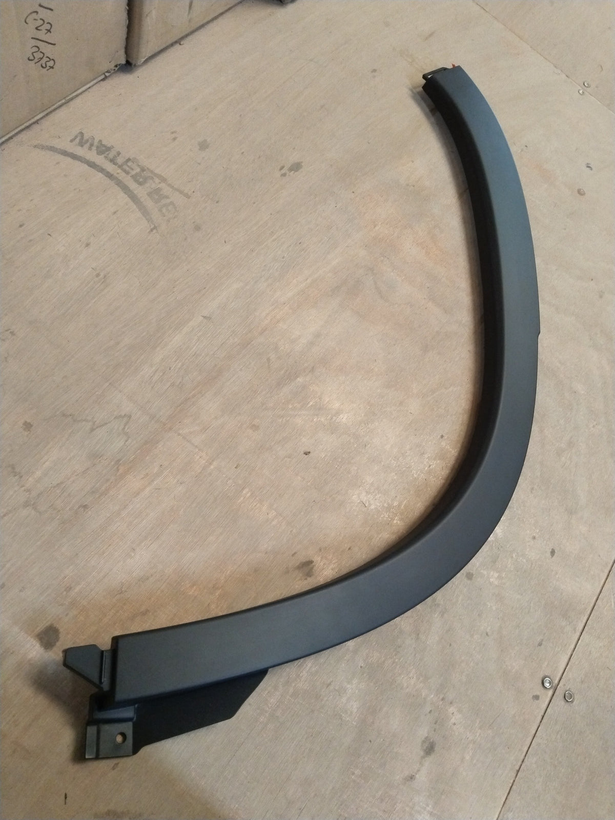 Maruti Suzuki right rear guard assembly splash fender for Swift, Dzire, Baleno, Ertiga, Brezza, shown in black plastic.