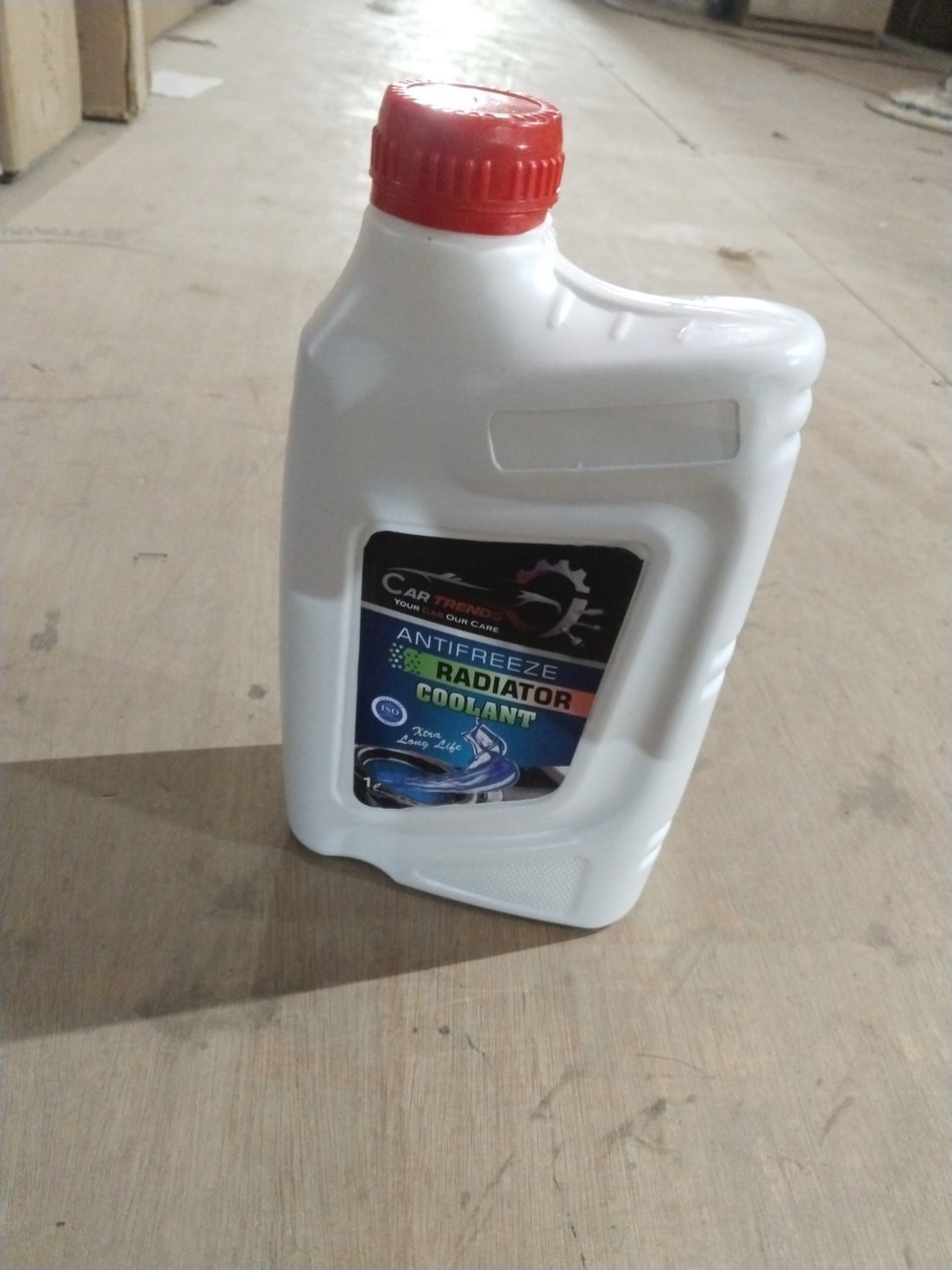 Blue CarTrends coolant bottle for all car types, 1-liter size, showing the blue liquid inside the container.