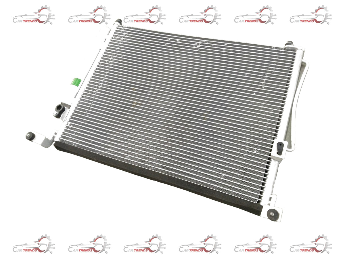 General Motors condenser assembly for Chevrolet Enjoy air conditioning system, showing metal fins and connections.
