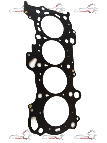 Maruti Suzuki head gasket for Ertiga, replacement engine part with detailed metal and rubber sealing surfaces.