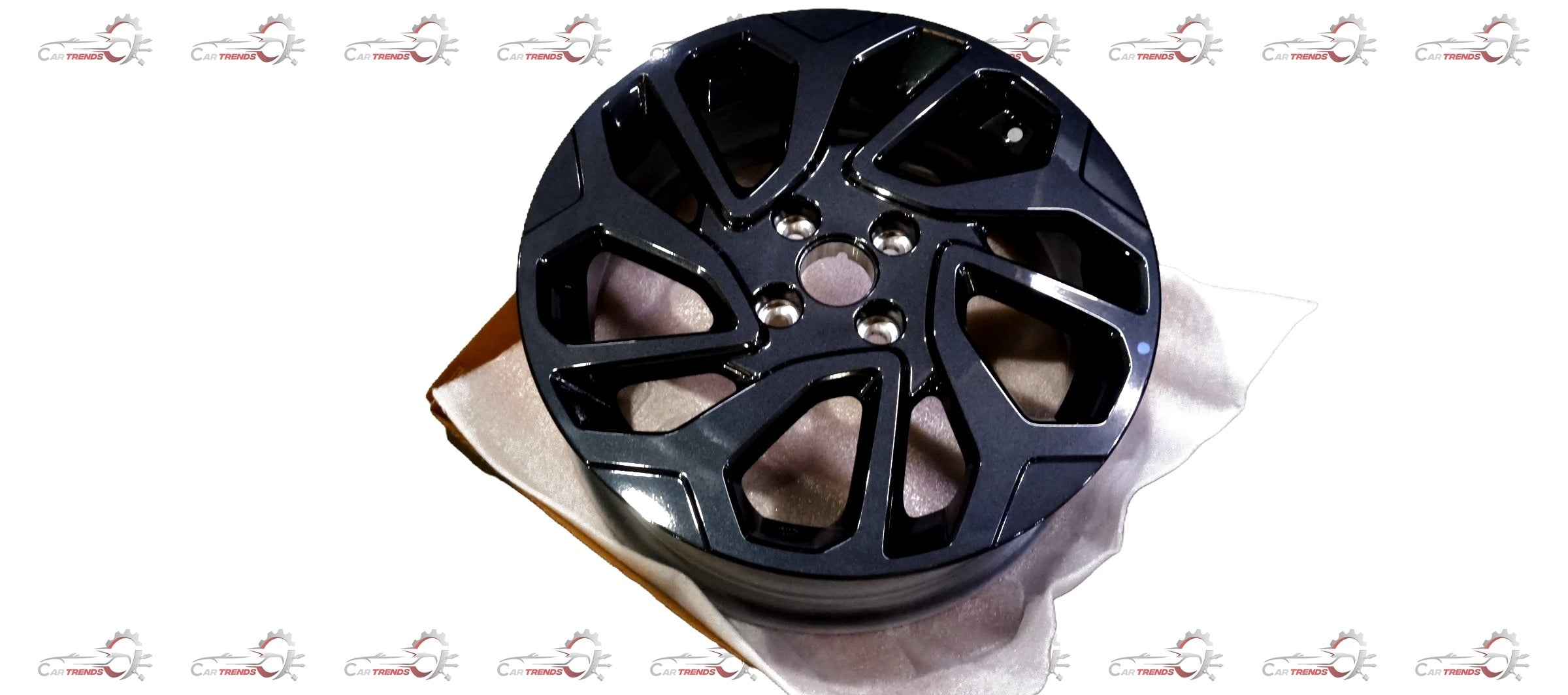 Maruti Suzuki alloy wheel for Fronx model, featuring a stylish multi-spoke design in silver finish.