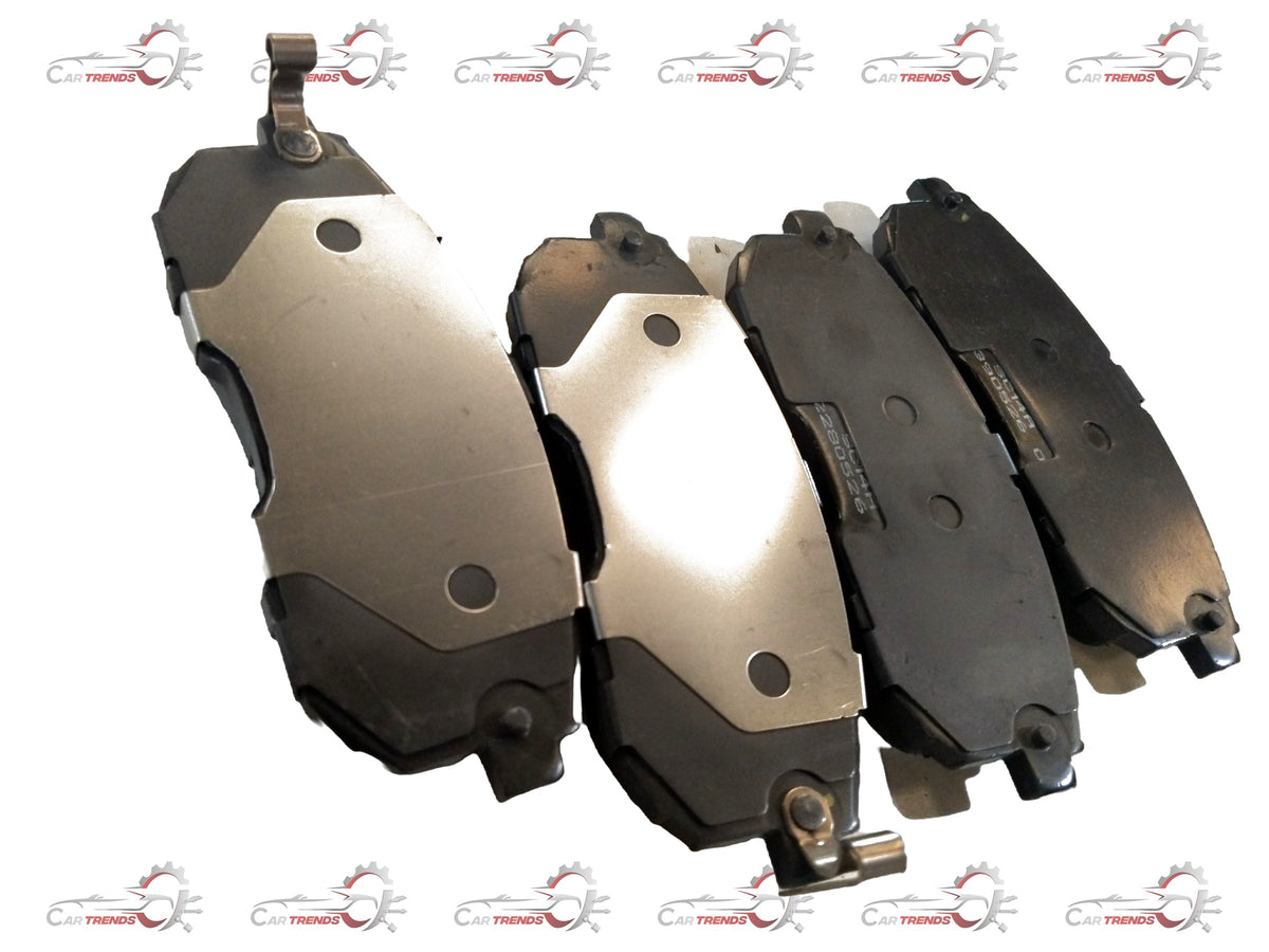 Front brake pad for Maruti Suzuki Brezza and Baleno, part number 55810M65M00, showing the new brake pad with metal backing and friction surface.