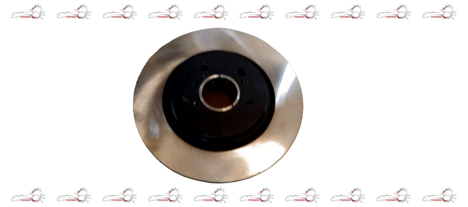 Front disc brake for Maruti Suzuki Invicto, shown in the CarTrends image, featuring ventilated metal disc for vehicle safety.