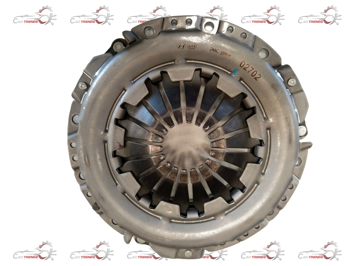 Hyundai i10/Santro 1.1 petrol pressure plate spare part, showing metallic component with bolt holes for clutch assembly.