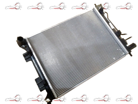 Hyundai Grand i10/Xcent 2013-2019 radiator assembly for petrol engine, showing the radiator core and mounting brackets.