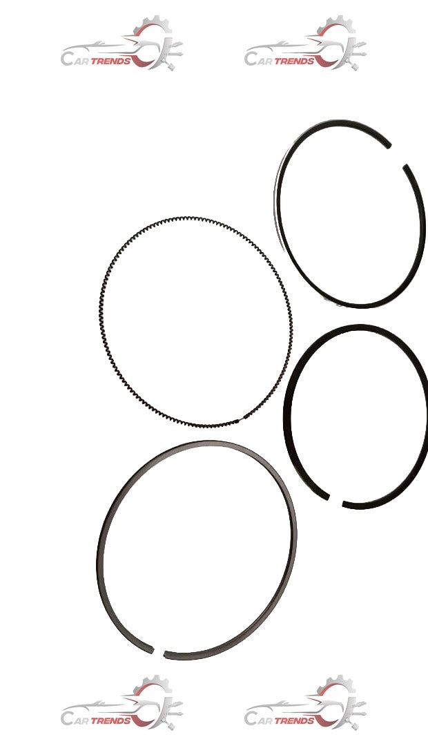 Suzuki SX4 piston ring set from CarTrends, showing shiny metal piston rings arranged in a neat set for engine repair.