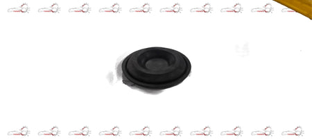 Chevrolet Optra plug hole N40 cover by General Motors, close-up view showing the black plastic automotive part.
