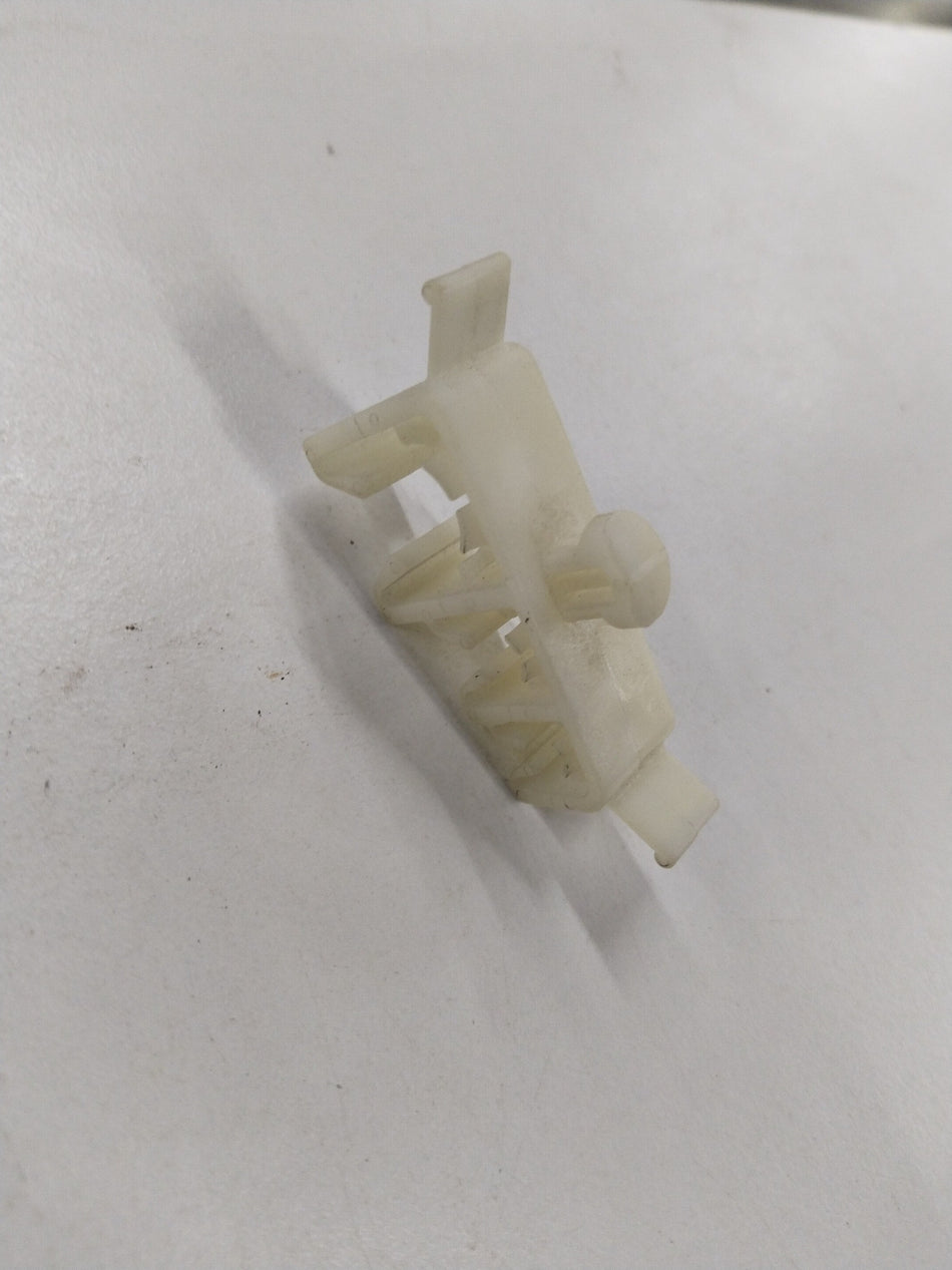 Chevrolet Tavera clip feed pipe from General Motors, showing the black plastic component used in engine fuel or oil systems.