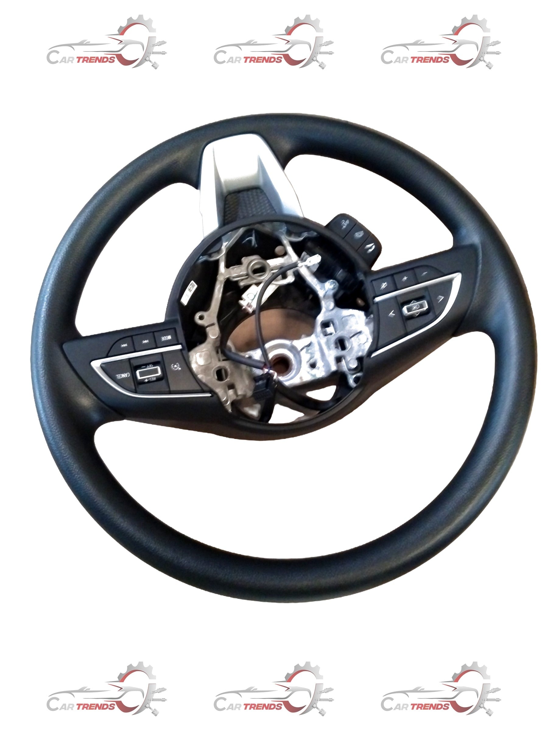 Maruti Suzuki steering wheel assembly showing the complete steering wheel and central hub in close-up.