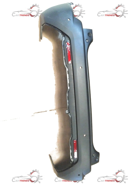 Maruti Suzuki rear bumper for Brezza 2nd Gen (2022+) petrol and CNG models, showing the bumper assembly and mounting points.