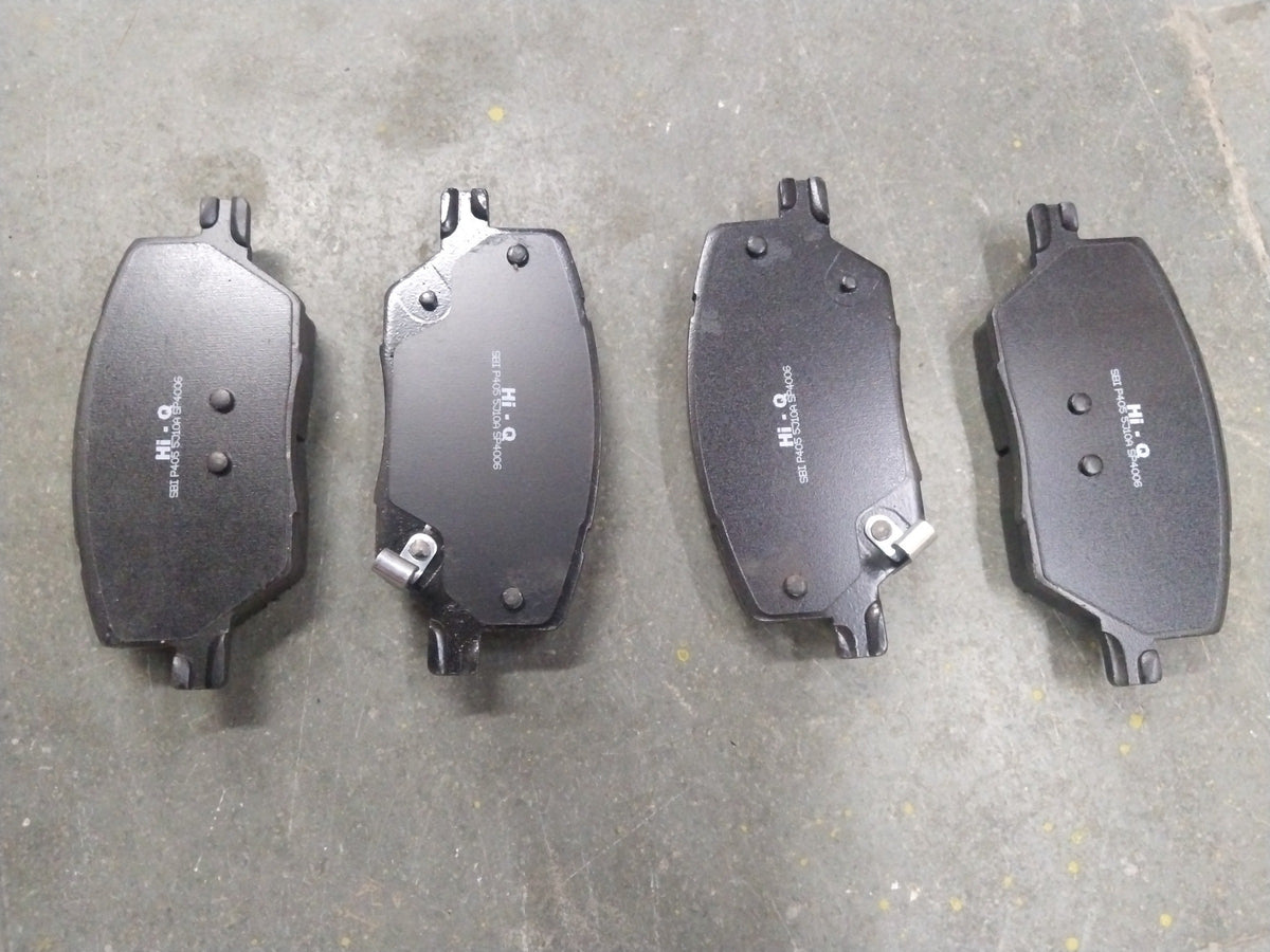 Front brake pad by CarTrends, Compass SP4006 model, showing the friction surface and metal backing plate.
