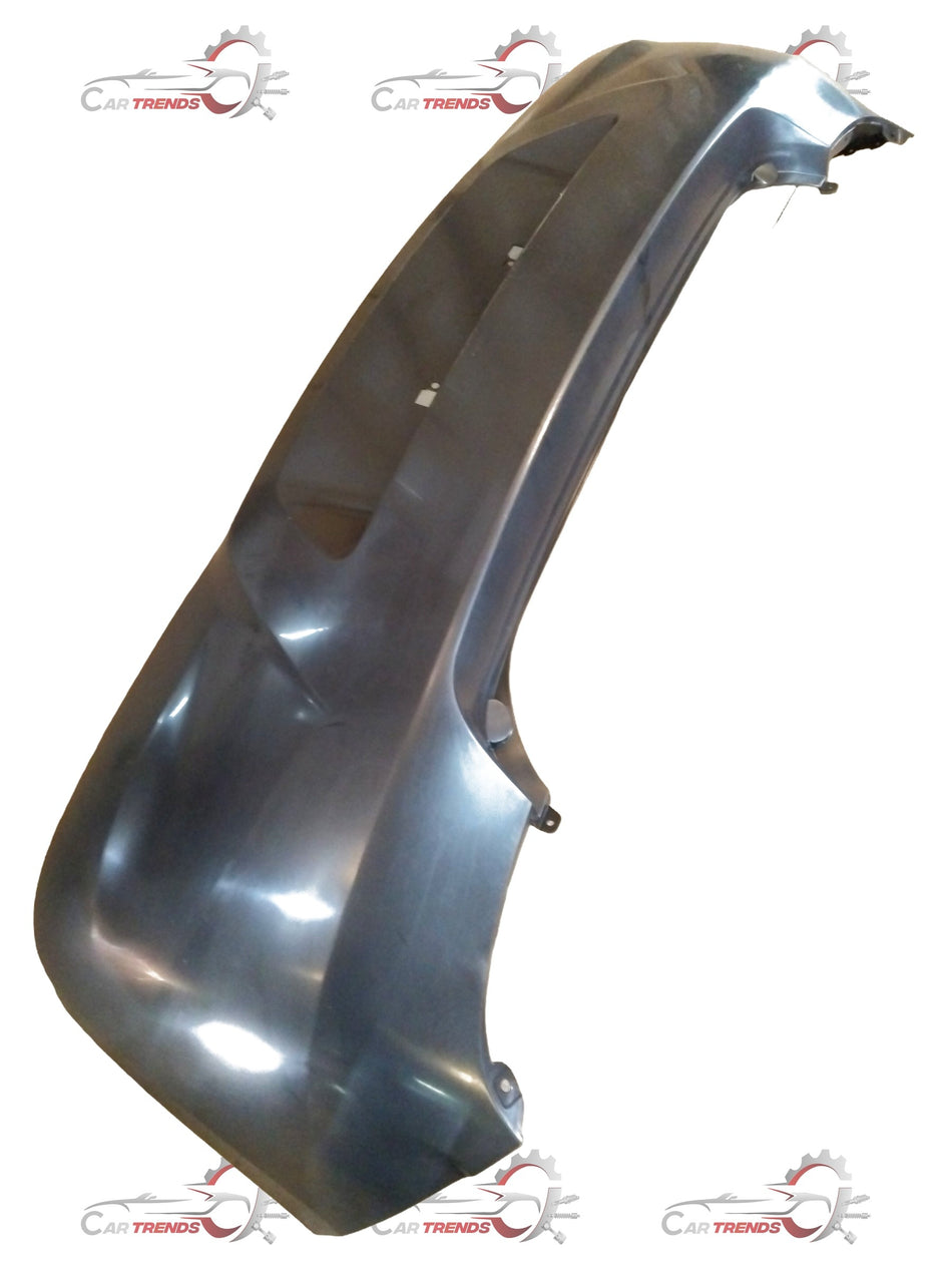 Hyundai I20 rear bumper in black, showing the exterior view with mounting points and smooth finish.