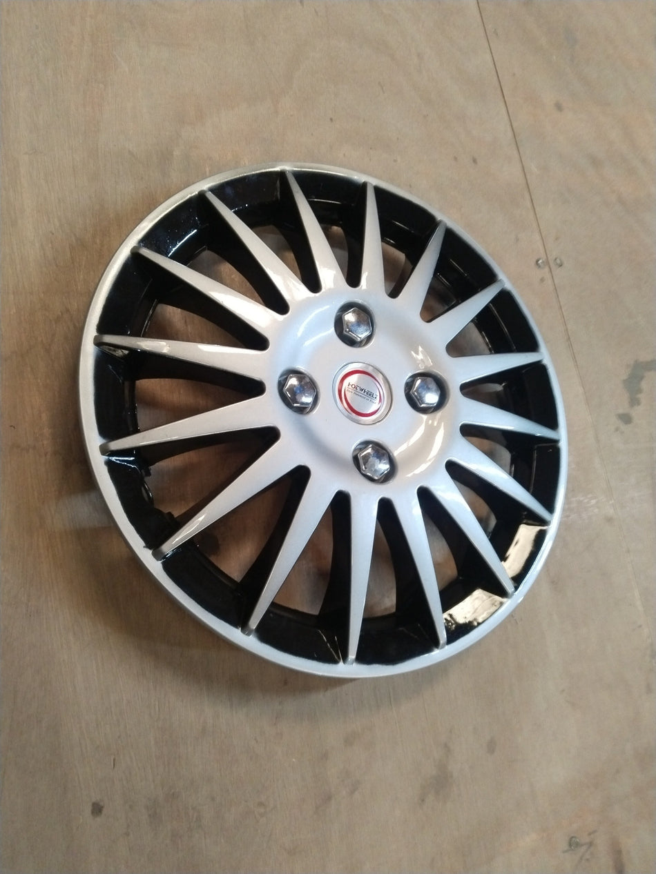 CarTrends 14-inch Wheel Cover DLX for Swift, i20, Baleno, Figo, featuring a sleek design on a car wheel.
