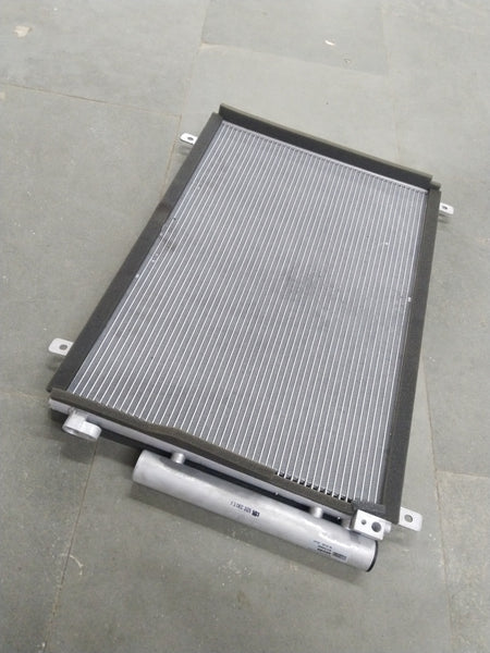 CarTrends Swift Deizre Type 3 condenser for automotive cooling, showing the compact metal core and fittings.