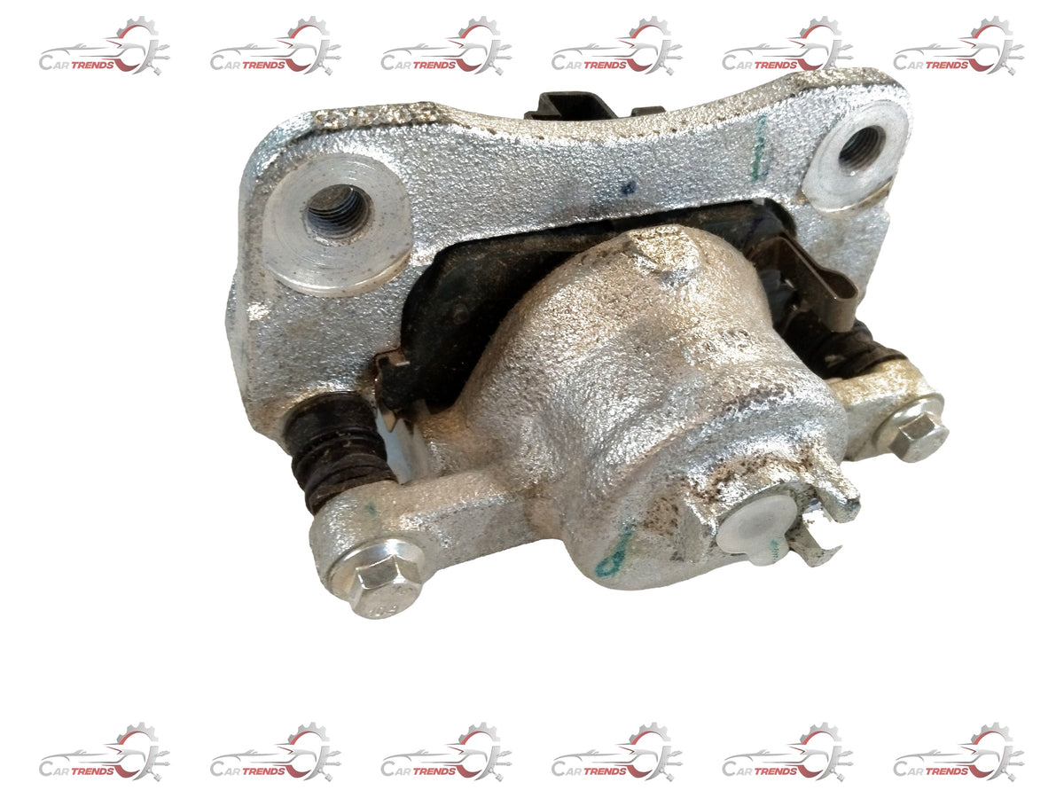 Maruti Suzuki brake caliper for Celerio, left side, CarTrends brand, showing the metallic component with mounting points.