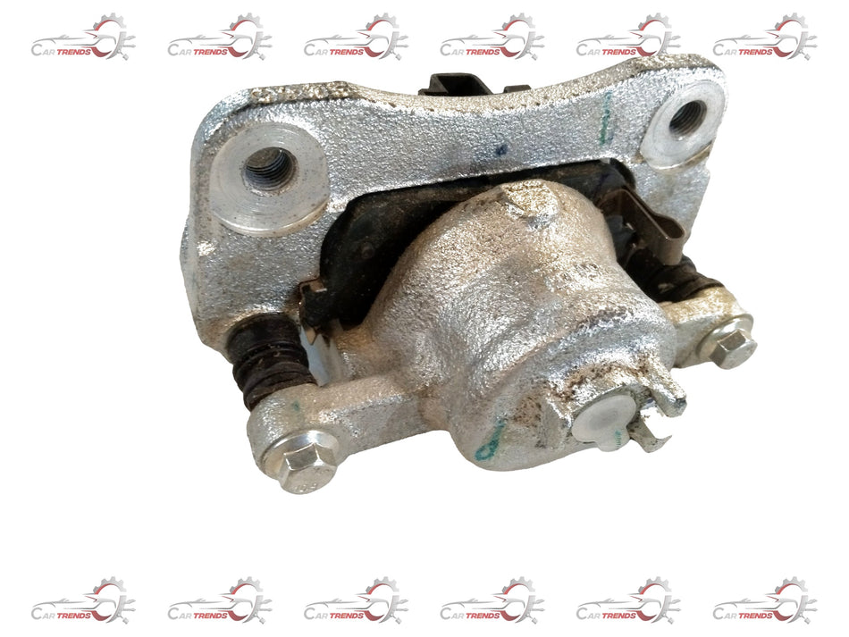Maruti Suzuki brake caliper for Celerio, left side, CarTrends brand, showing the metallic component with mounting points.