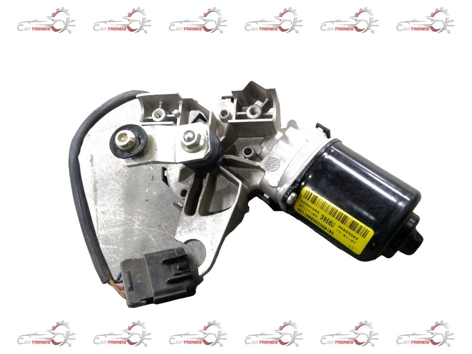 Chevrolet Cruze motor windshield washer fluid reservoir with cap, branded by General Motors, for vehicle windshield cleaning.