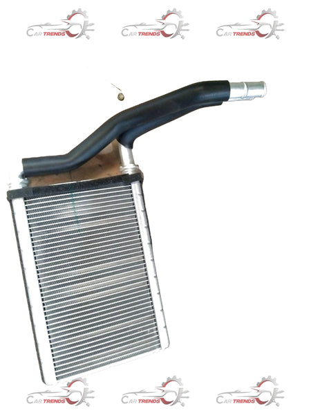CarTrends heater core spare part for Suzuki Swift Dezire, showing the metal core with inlet and outlet connections.