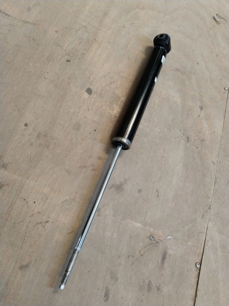 Hyundai Creta or Alcazar rear shocker, automotive suspension component with part number 55307BV000, installed on vehicle.