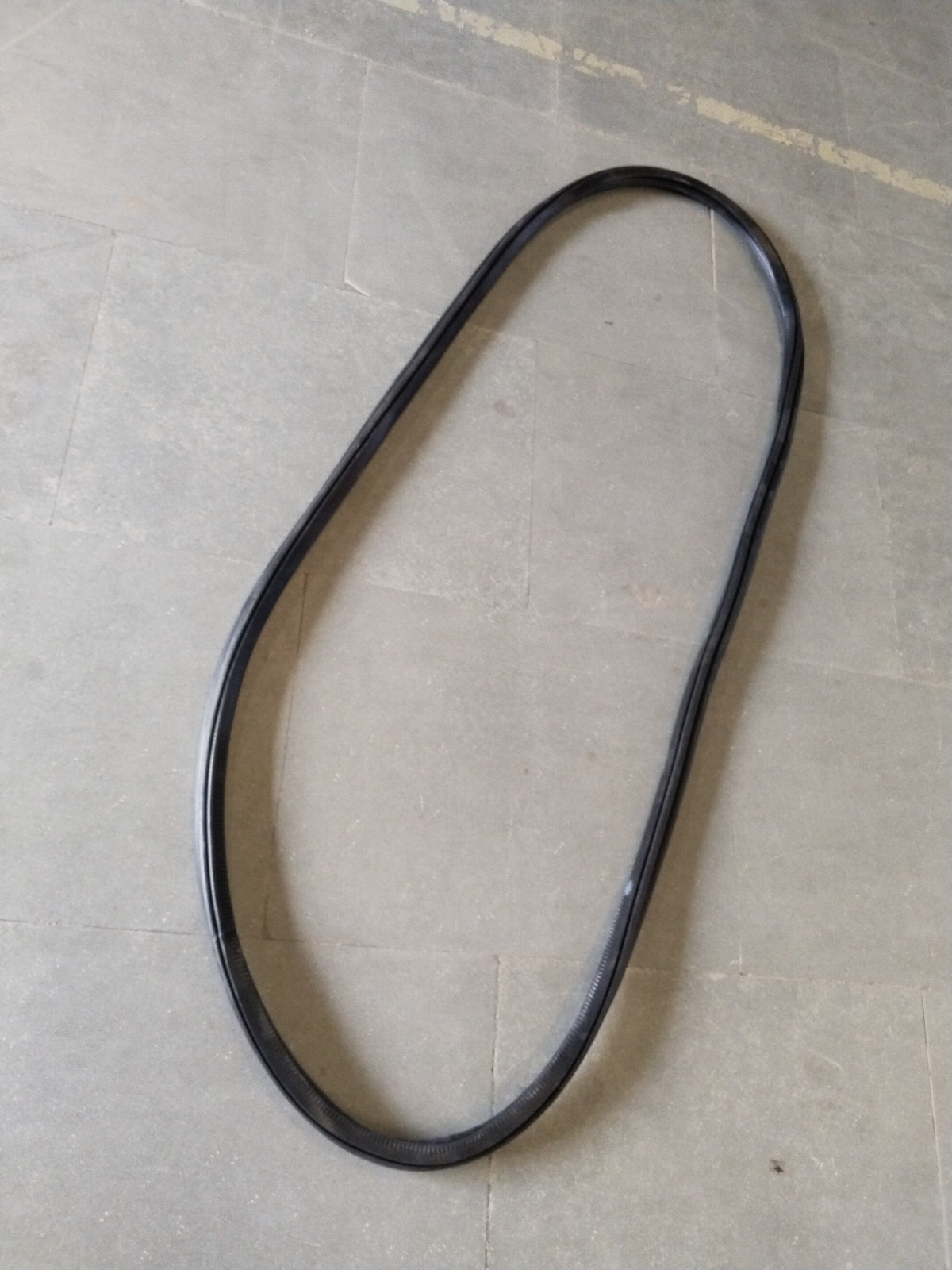 CarTrends door seal for Skoda Kushaq, side door weather stripping, black rubber gasket, close-up view of sealing edge.