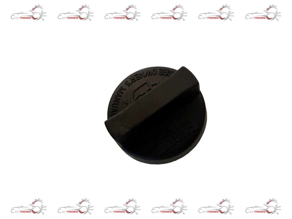 Maruti Suzuki oil filler cap in black with metal finish, designed for engine oil reservoir, showing detailed close-up image.