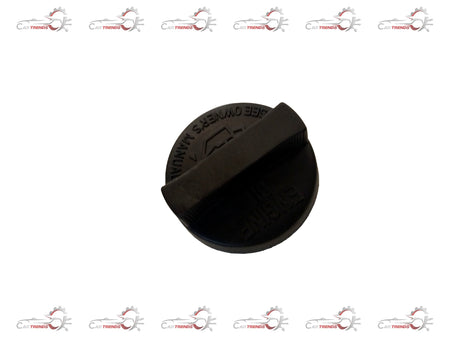 Maruti Suzuki oil filler cap in black with metal finish, designed for engine oil reservoir, showing detailed close-up image.