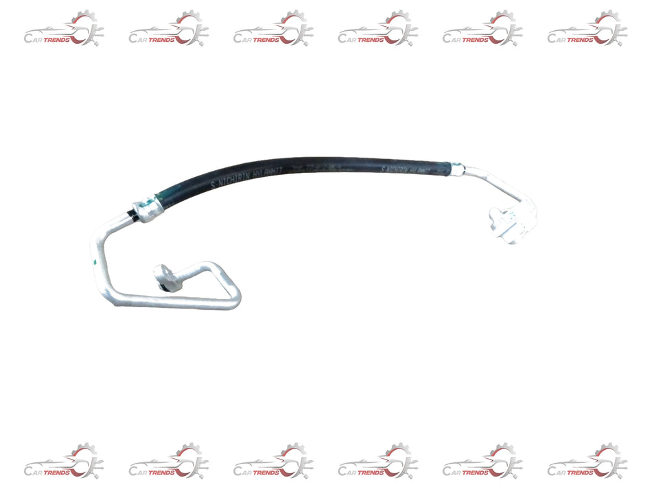 Maruti Suzuki discharge hose with part number 95720M69R00, flexible rubber hose for vehicle fluid discharge application.