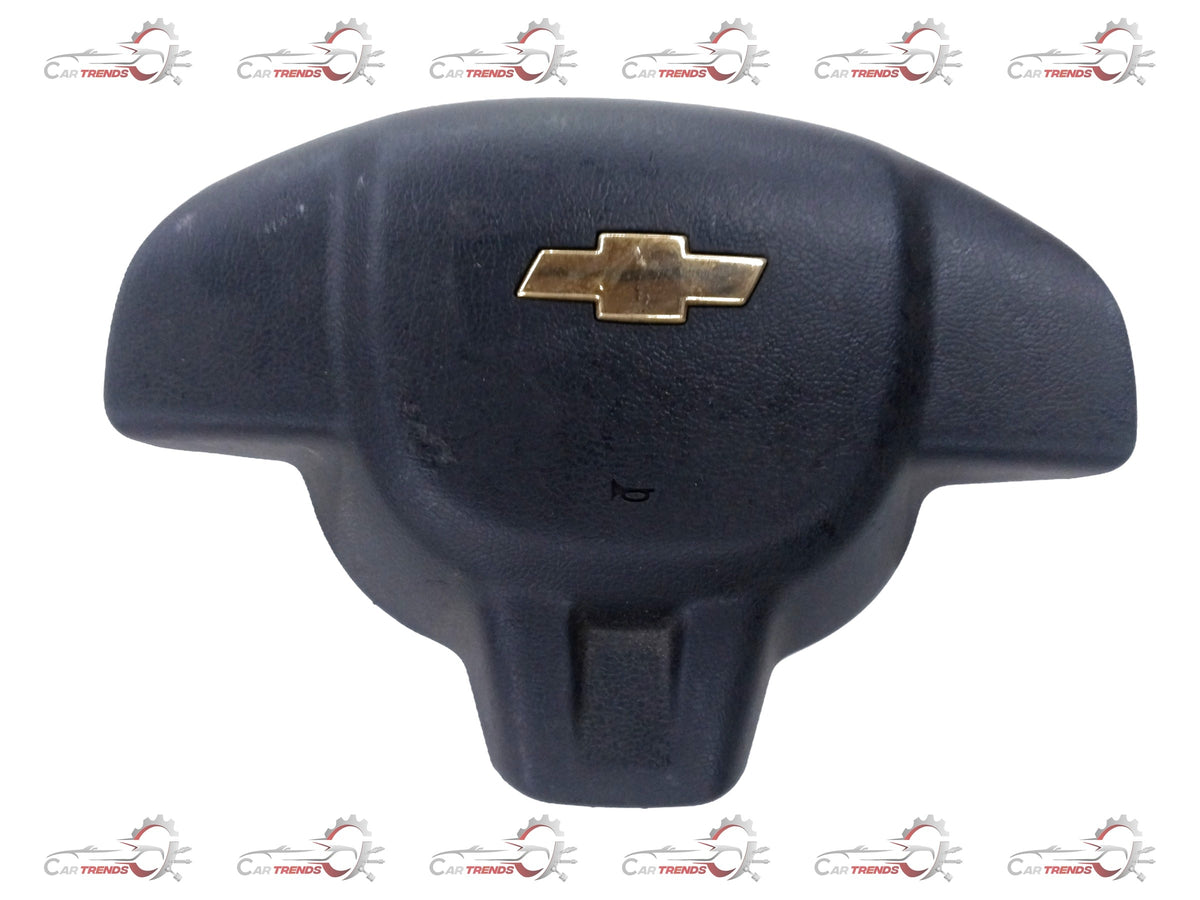 Steering wheel assembly for Chevrolet Tavera by General Motors, showing the black wheel with mounting hardware.