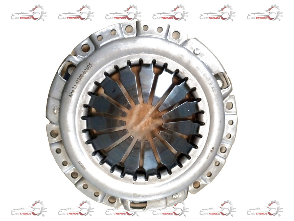Hyundai clutch cover assembly spare part showing the metallic clutch cover with bolt holes and mounting surface.