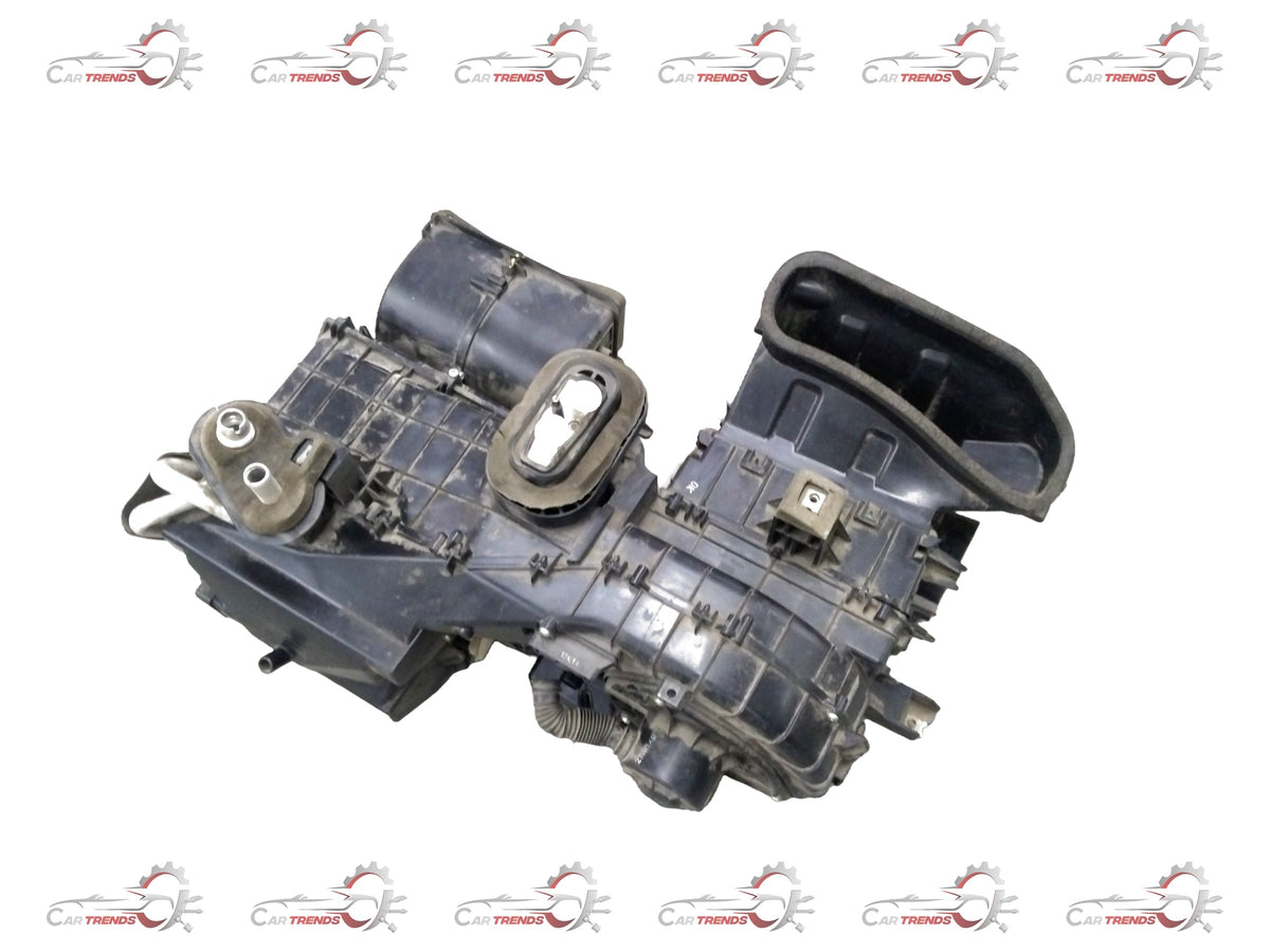 General Motors Chevrolet Beat air conditioning evaporator module assembly, showing the heater and cooling components.